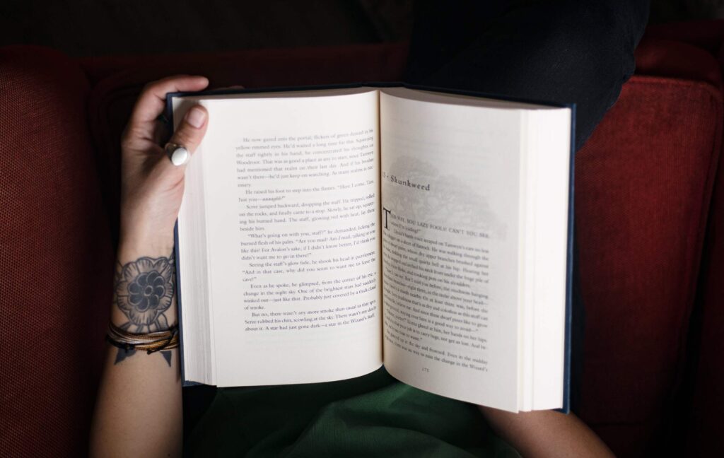 not me but the first person perspective of a person reading a book.